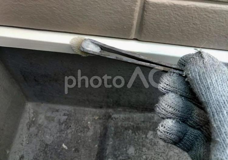 水切り上塗り様子 水切り,上塗り,手の写真素材