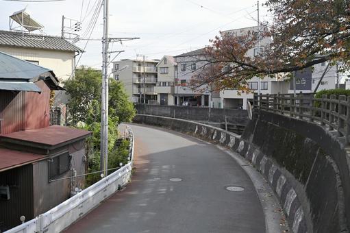 カーブする道 浦安,道路,町並みの写真素材