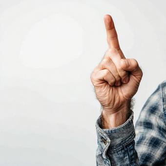 アイデアを表現する男性の指差し アイデアを表現する男性の指差しの写真