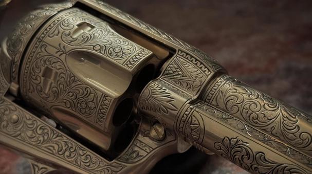 エングレーヴの施された回転拳銃 エングレーヴの施された回転拳銃 ミリタリー,西部劇,リボルバーの写真素材