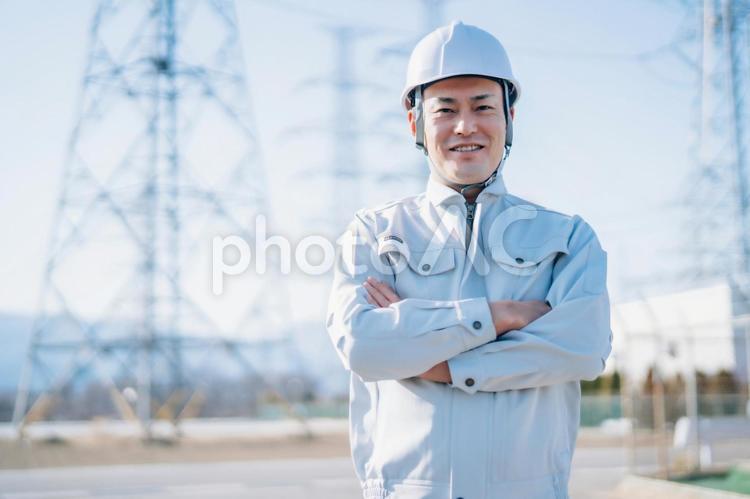 電気工事士・電力会社・作業着を着た男性 電力会社,電気工事士,作業員の写真素材