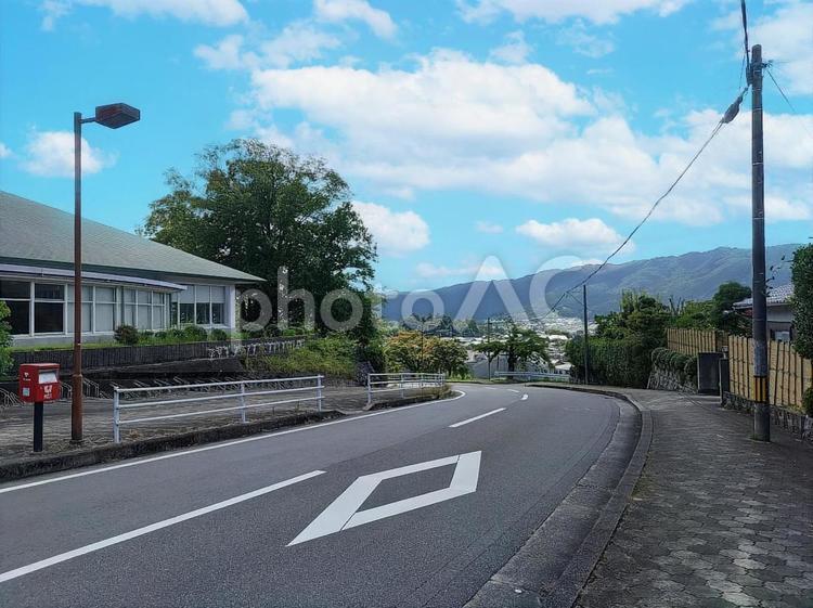 ポストのある風景 道路,風景,空の写真素材