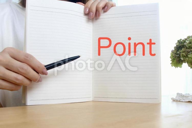 ペンを持つ女性の手　Pointイメージ ポイント,point,注目の写真素材