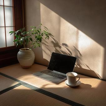 日本の和室とパソコンとコーヒーカップ 日本の和室とパソコンとコーヒーカップの写真