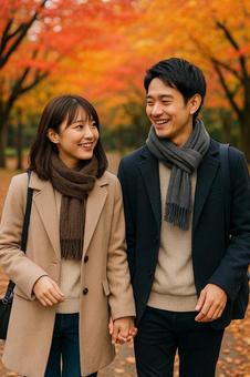 紅葉が茂る公園でデート 紅葉が茂る公園でデートの写真