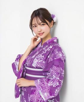 鮮やかな浴衣を着た日本人女性 鮮やかな浴衣を着た日本人女性の写真