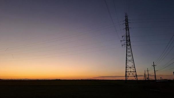 Sunset sky and steel tower, JPG