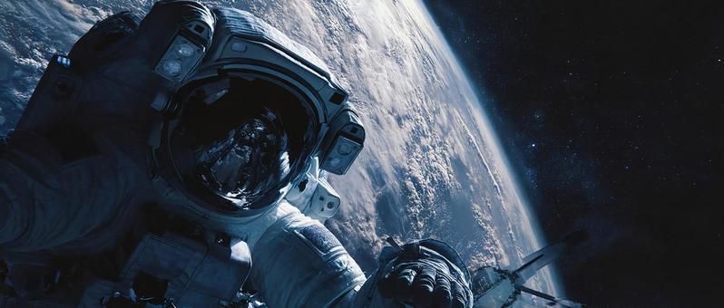 地球と宇宙飛行士の眺め 地球と宇宙飛行士の眺めの写真
