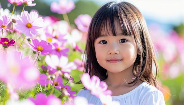 かわいい少女のポートレート コスモスの花 かわいい少女のポートレート コスモスの花の写真