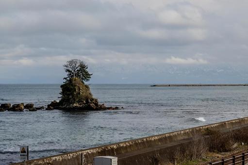 雨晴海岸 雨晴海岸 雨晴海岸,女岩,海の写真素材