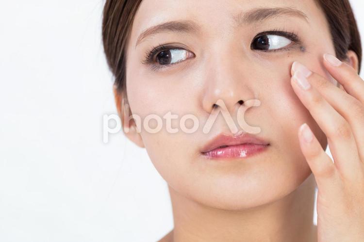 スキンケアイメージ 人物,悩み,表情の写真素材