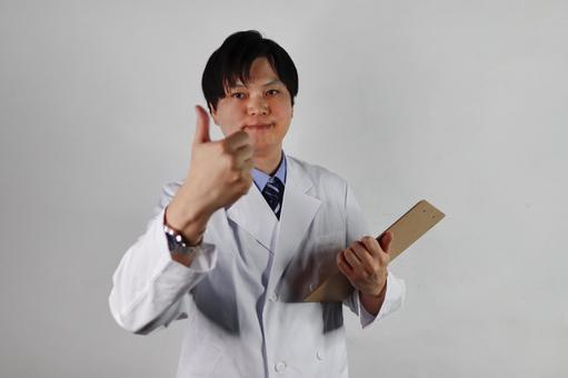 Smiling doctor with thumbs up, JPG