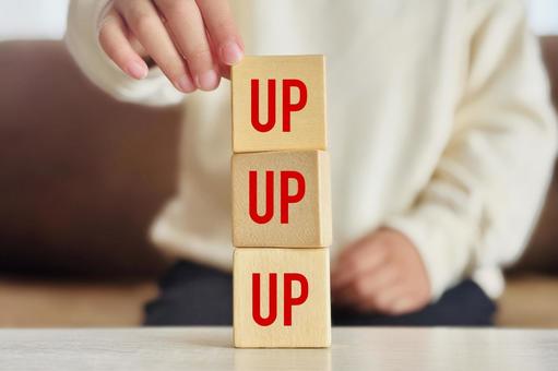 Level up image and child's hands, JPG