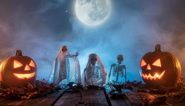 月夜の骸骨おばけとハロウィンかぼちゃの写真