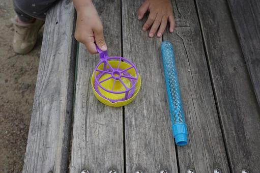 Child playing with soap bubbles, JPG Child playing with soap bubbles, JPG