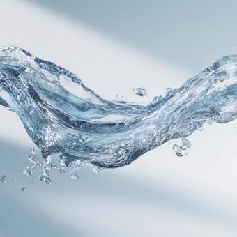 躍動感あふれる水の波紋と水しぶき 躍動感あふれる水の波紋と水しぶきの写真