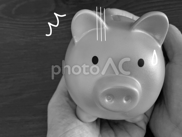 ショックを受ける豚の貯金箱 お金,貯金箱,ショックの写真素材