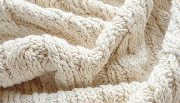 暖かみのある手編みニット素材の写真