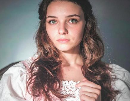 グリーンアイの女性のクローズアップの写真