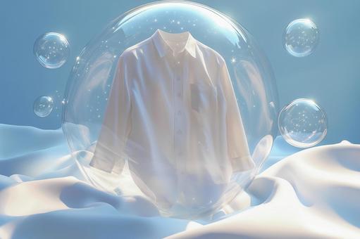 洗濯して泡に包まれた清潔な白シャツの写真