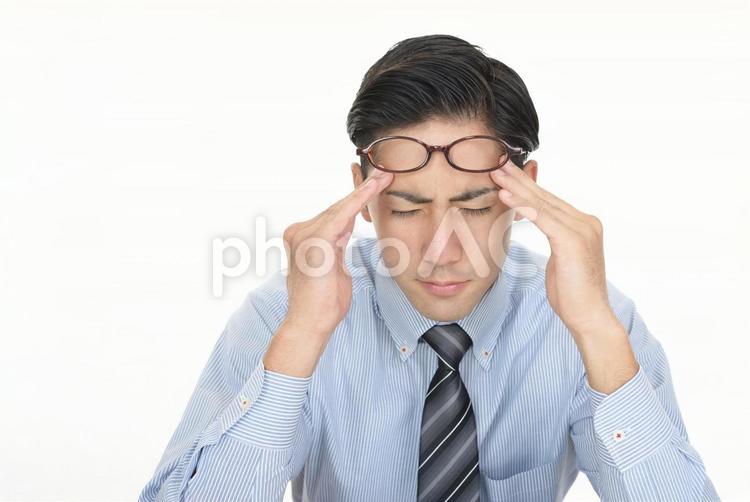 体調不良の男性 仕事,ビジネスマン,ビジネスの写真素材