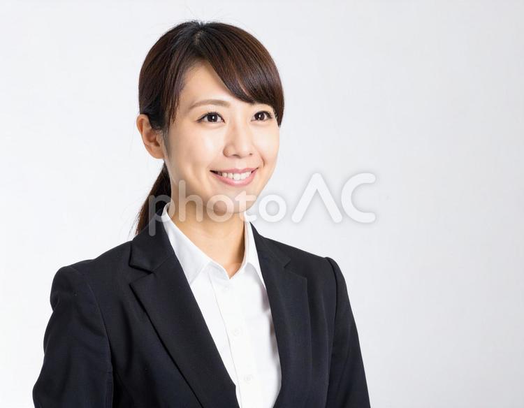 スーツ姿の笑顔の女性 女性,スーツ,日本人の写真素材