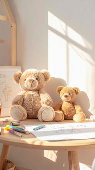 机の上に並ぶ2匹のクマのぬいぐるみの写真