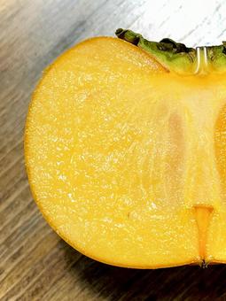 半分に切った柿 03 柿,平田柿,果物の写真素材