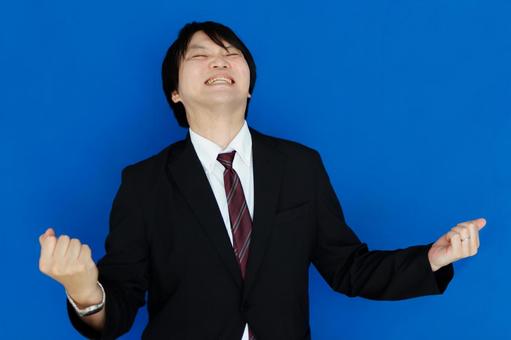 喜びのビジネスマン 喜びのビジネスマン ビジネスマン,男性,スーツの写真素材