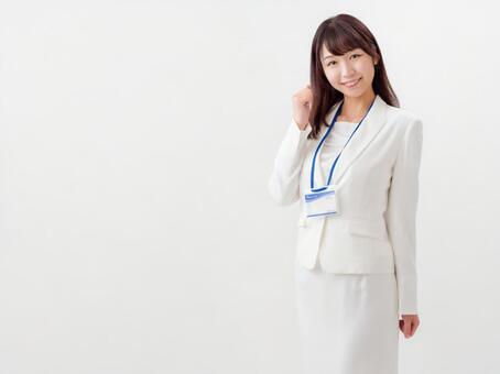 Image of career woman doing guts pose Image of career woman doing guts pose