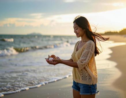 女性 ビーチ リゾート サンセット 夏 女性 ビーチ リゾート サンセット 夏の写真