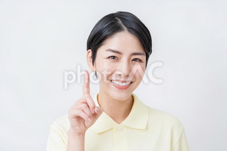 提案する介護士の女性。 介護,介護福祉士,介護士の写真素材