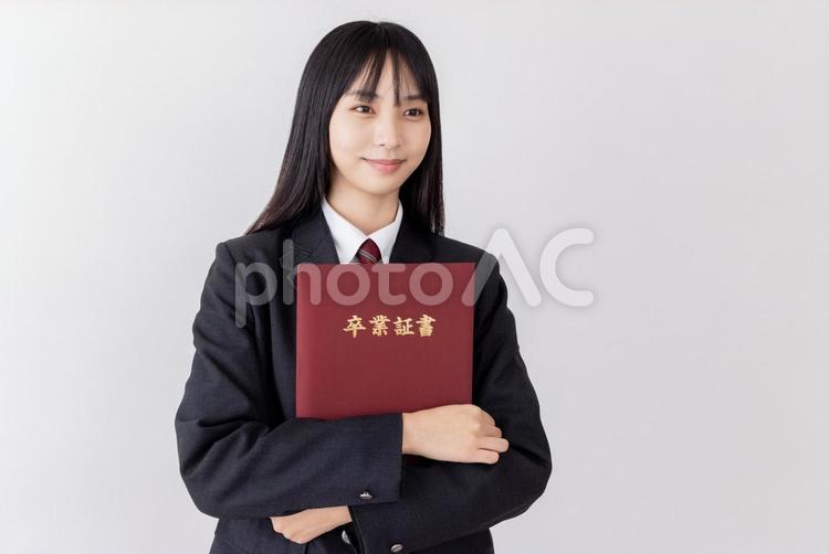 卒業式　女子高生　サクラサク 女性,女子高生,卒業式の写真素材