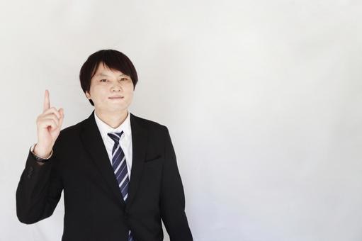 ビジネスマンが提案や説明をするシーン ビジネスマン,スーツ,男性の写真素材