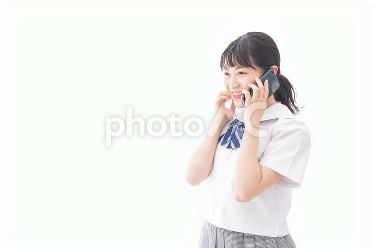 スマホを使う学生 スマホ,スマートフォン,携帯の写真素材