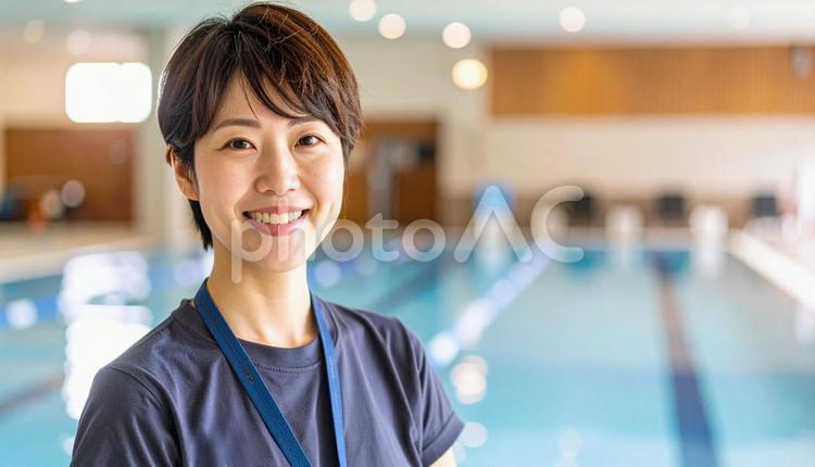 屋内プール受付スタッフ スポーツジム,受付,女性の写真素材