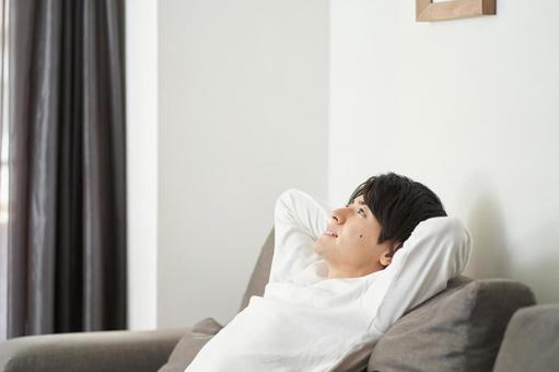 Asian man relaxing in the living room, homem, relaxar, relaxar, JPG