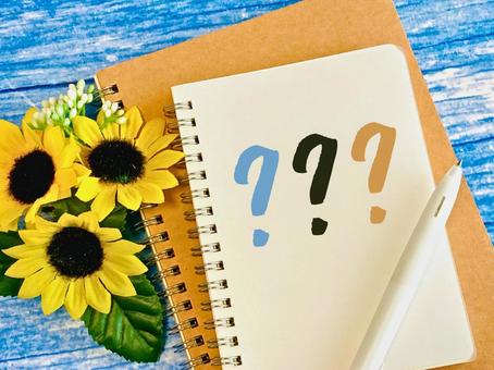A notebook with a sunflower and a question mark, JPG A notebook with a sunflower and a question mark, JPG