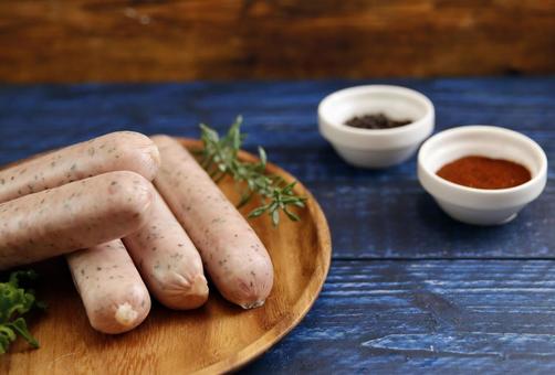 ハーブ入り生ソーセージ盛り付け ハーブ入り生ソーセージ盛り付け ソーセージ,生肉,ハーブの写真素材