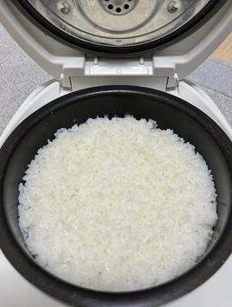 Stockpiled rice Rice in a rice cooker, JPG Stockpiled rice Rice in a rice cooker, JPG