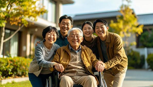 介護施設のシニア男性と見舞いに来た家族 介護施設のシニア男性と見舞いに来た家族の写真