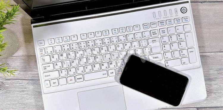 ビジネス　スマホとパソコン　バナー素材 ビジネス,同期,転送の写真素材