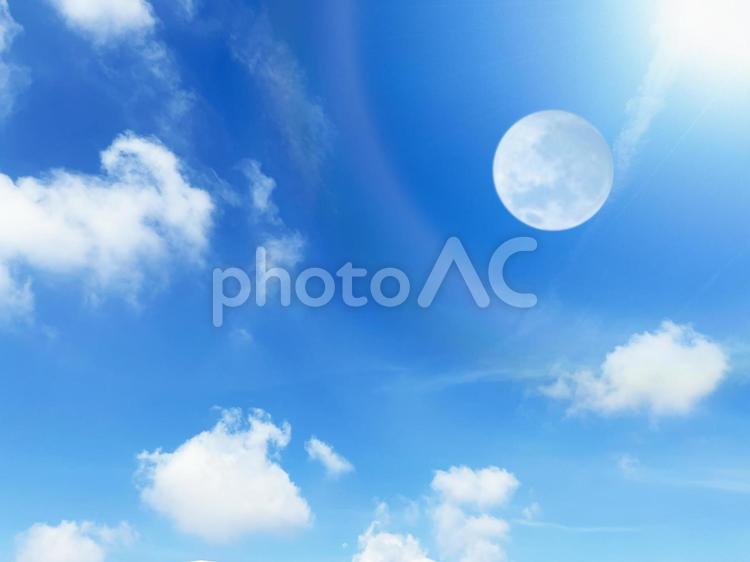 晴れの日の美しい空と雲と太陽　背景素材 空,雲,月の写真素材
