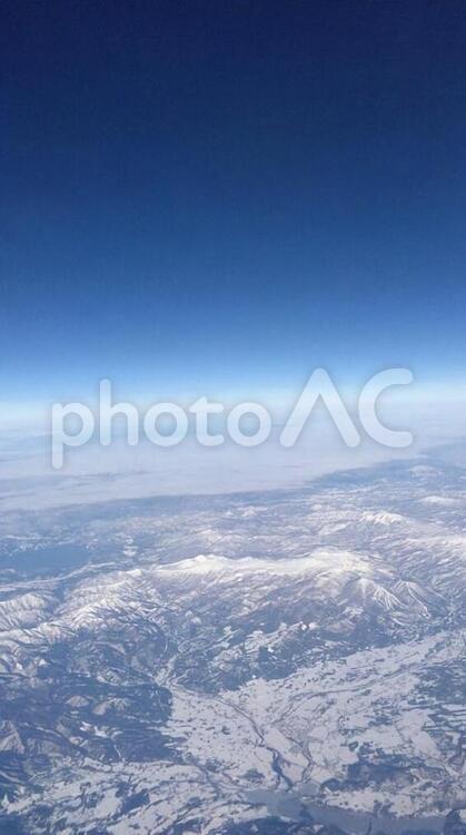 飛行機からの青空と地形 青空,空,青の写真素材