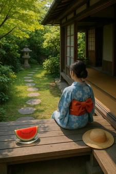 縁側で浴衣の女性とすいか 夏イメージ 縁側で浴衣の女性とすいか 夏イメージの写真