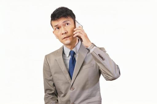 電話する男 仕事,ビジネス,会社員の写真素材