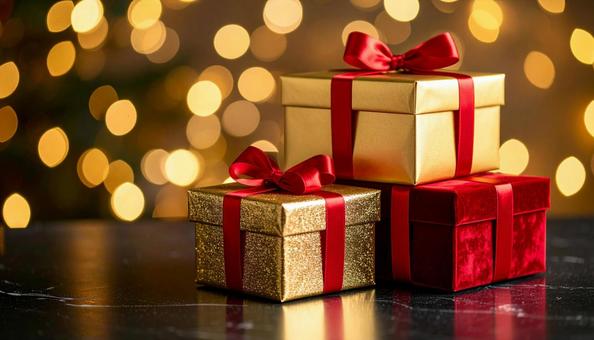 クリスマスプレゼント・赤とゴールドギフトの写真