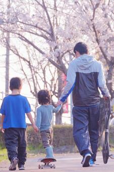 父と息子達の外遊び 親子,父,息子の写真素材