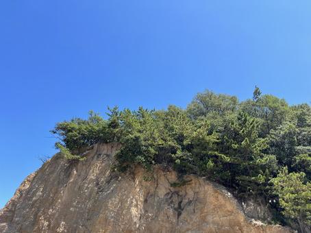 小豆島の島と青空が広がる風景 小豆島の島と青空が広がる風景 小豆島,島,岩肌の写真素材