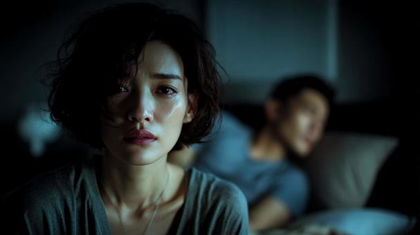 傷ついた心の夫婦の情景の写真